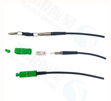 Through-the-wall fiber optic cable assembly